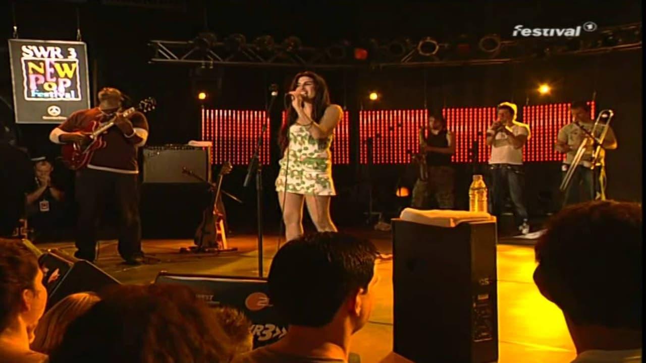 Amy Winehouse - Live At New Pop Festival backdrop