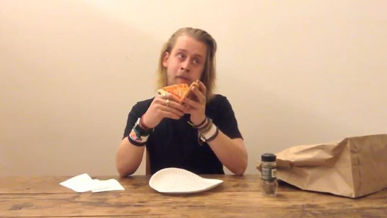 Macaulay Culkin Eating a Slice of Pizza backdrop