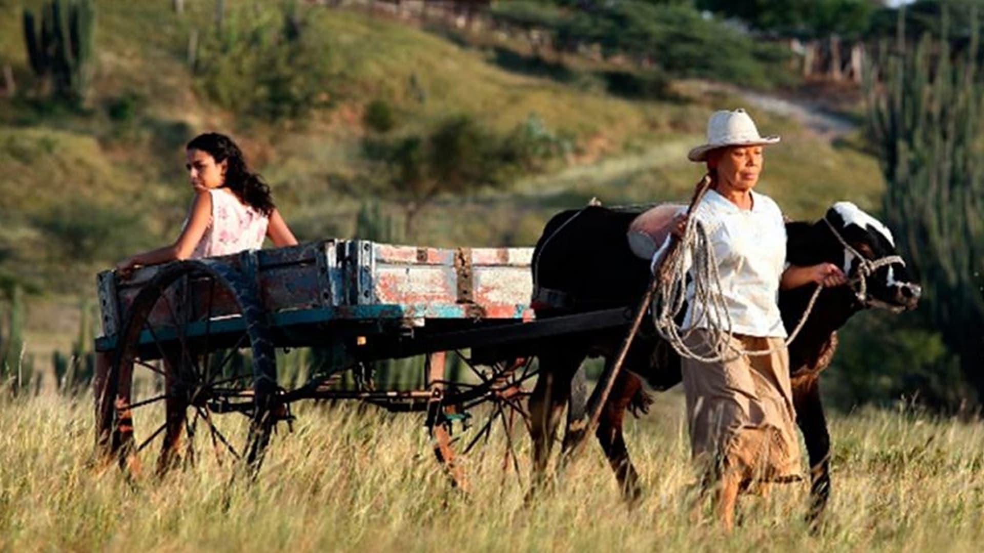 Dos mujeres y una vaca backdrop