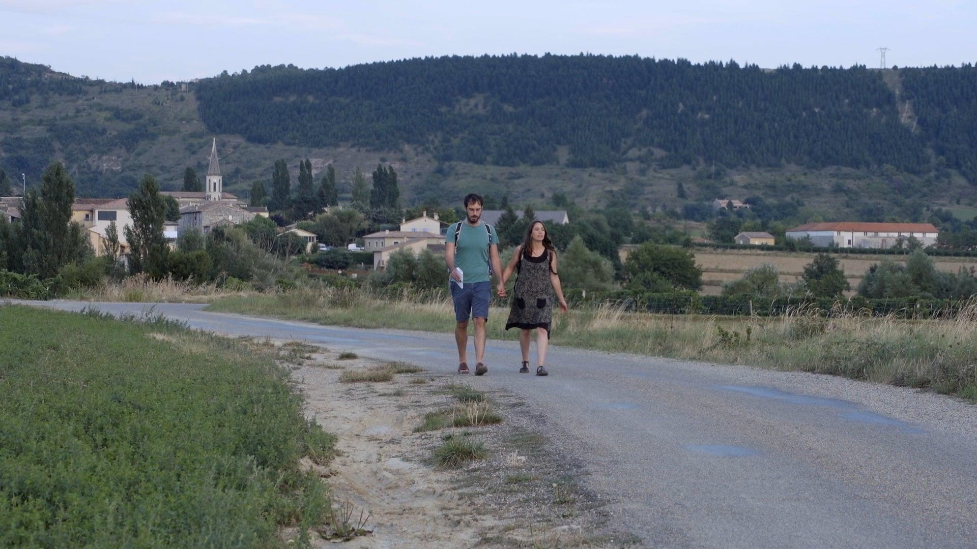 The Grocer's Son, the Mayor, the Village and the World backdrop