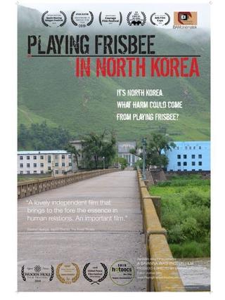 Playing Frisbee in North Korea poster