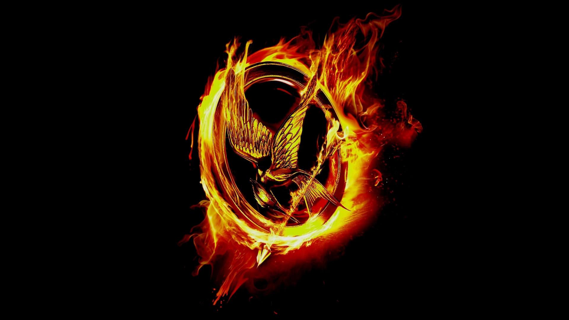 The Mockingjay Lives: The Making of the Hunger Games: Mockingjay Part 1 backdrop